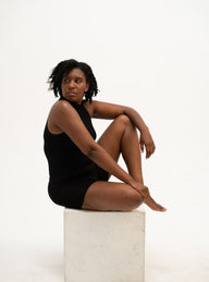 The model is wearing a pair of boyshort underwear for women in black color. Eco-friendly breathable and ultra-soft.