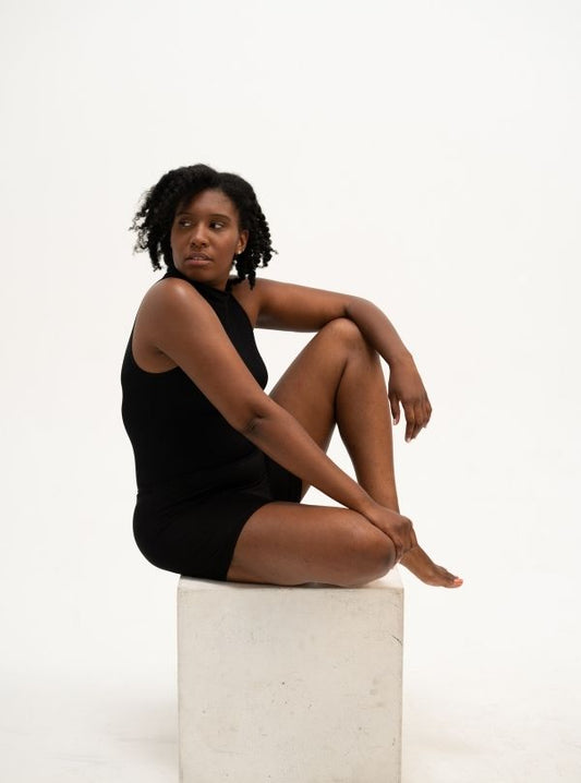 The model is wearing a pair of boyshort underwear for women in black color. Eco-friendly breathable and ultra-soft.