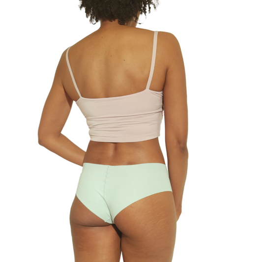 The model is wearing a teal color no-show panties from CLOECO brand. The ultra-soft, comfortable, and lightweight feelings were provided by the plant-based materials.