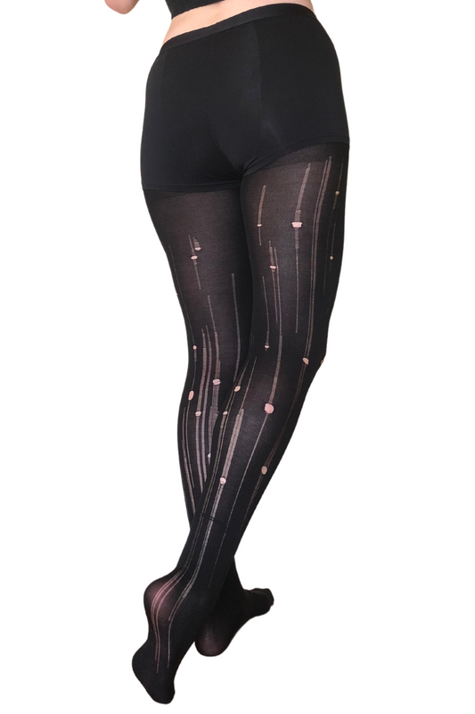 Women's black organic distressed tights from CLOECO brand. Made with natural material which provided the ultra-breathable and soft texture.