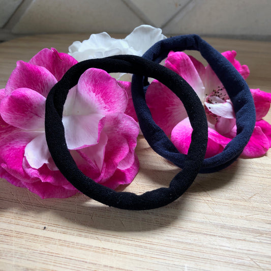 Two elastic and stretchy black hair ties from CLOECO brand.