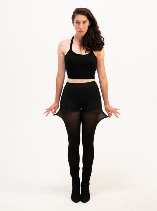 Dancer posing with eco friendly EVERTights from CLOECO. Showing their flexibility, and soft, itch-free material.